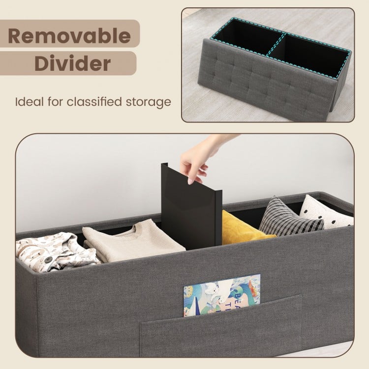 Folding storage ottoman bench in dark gray with removable divider, ideal for organized storage and versatile seating.