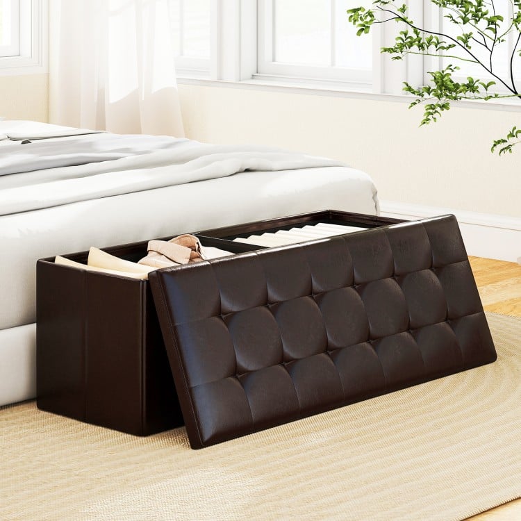 Brown folding storage ottoman bench with padded foam, removable divider, and side pocket for organized storage.