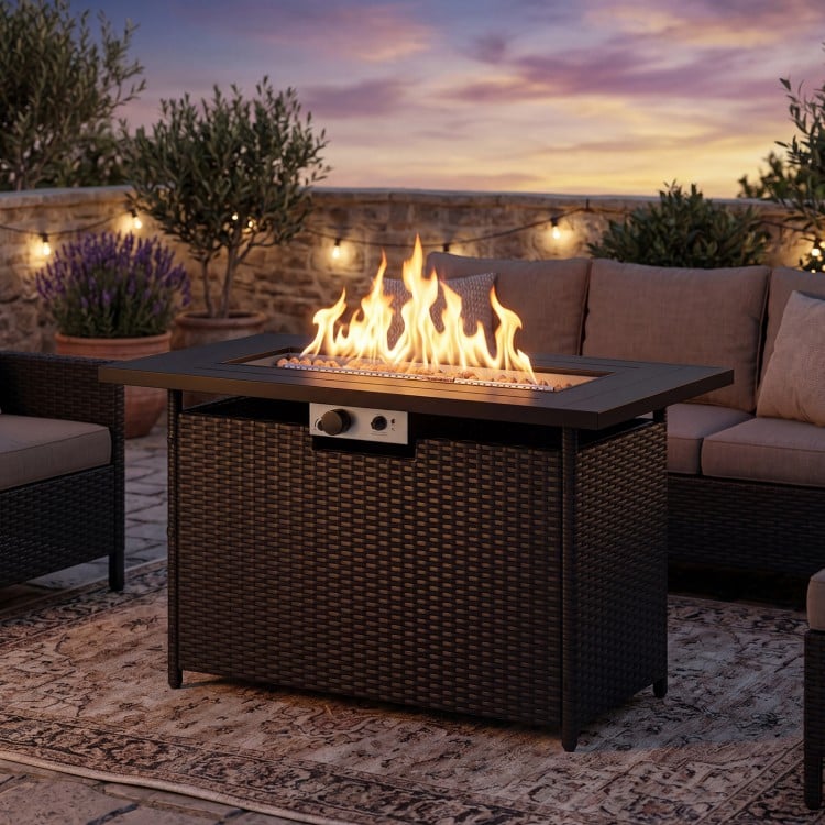 Side view of the 44.5-inch propane fire pit table with PE rattan design, ideal for cozy outdoor gatherings and dining.