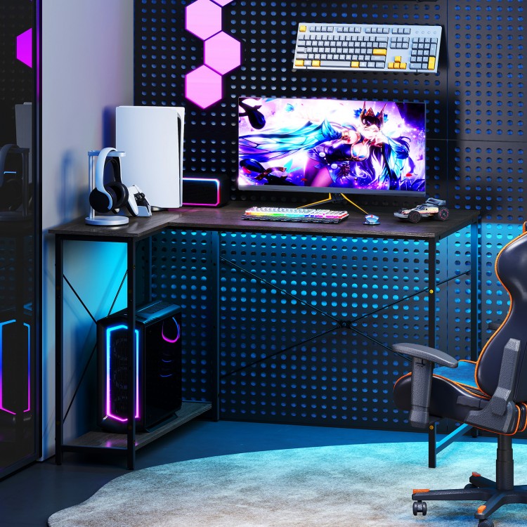 Reversible L-shaped computer desk with gray finish, featuring an ultra-wide desktop and adjustable shelves for.