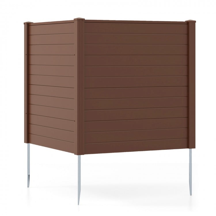 Brown outdoor privacy fence screen with galvanized metal stakes, ideal for concealing AC units and enhancing backyard.