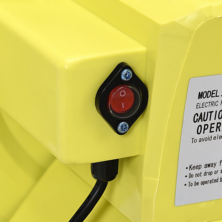 Close-up of the power switch on a 950 W air blower pump fan for inflatable bounce houses, featuring a durable yellow.