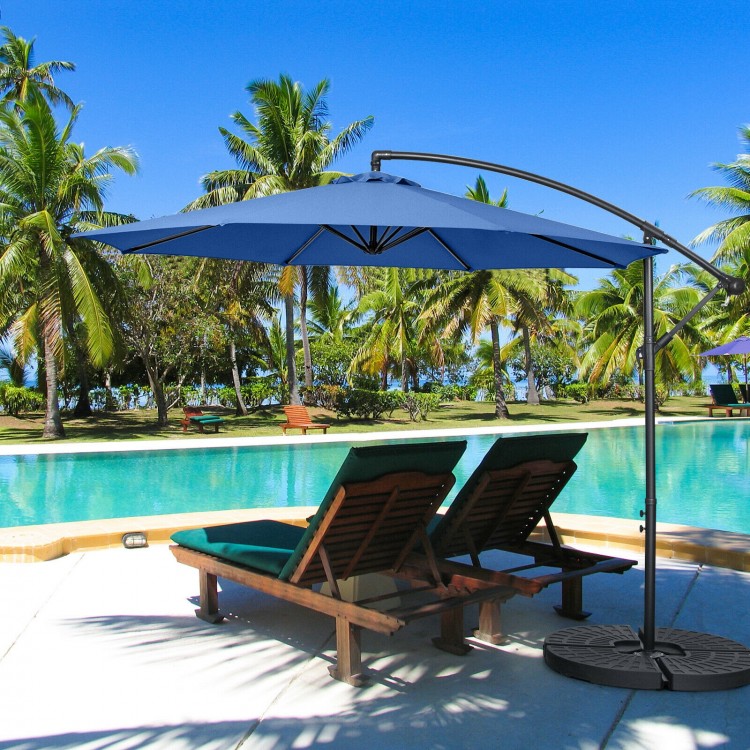 10FT blue offset umbrella with 8 ribs and cross base, providing adjustable shade for outdoor lounging by the pool.
