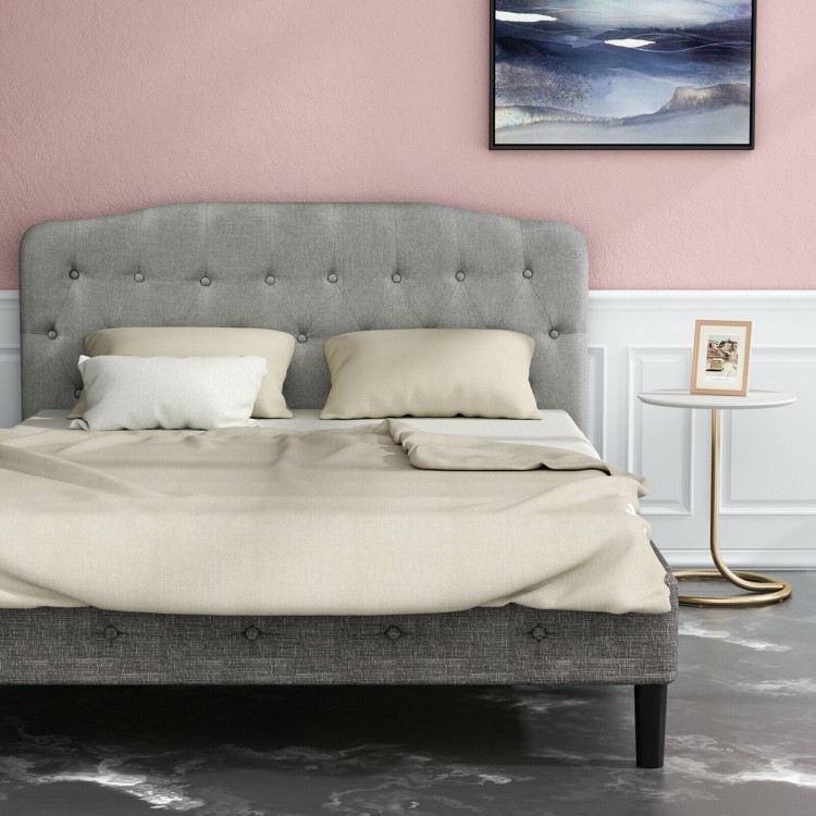 Queen upholstered headboard in light gray with button detailing, adjustable heights for versatile bedroom decor.