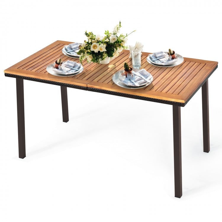 Acacia wood patio dining table with slatted surface, umbrella hole, and rust-proof legs, perfect for outdoor gatherings.