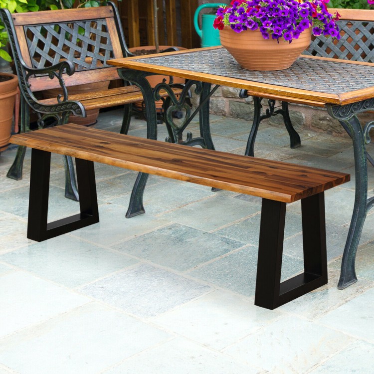 Solid acacia wood patio bench with metal legs, featuring a polished surface, ideal for outdoor dining setups.