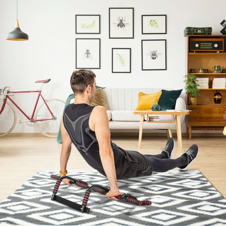 Multi-purpose pull-up bar in use for indoor training, featuring ergonomic grips and sturdy iron construction for up to.
