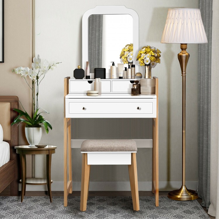 Vanity table set with large mirror, white finish, and cushioned stool, perfect for makeup and storage in any bedroom.