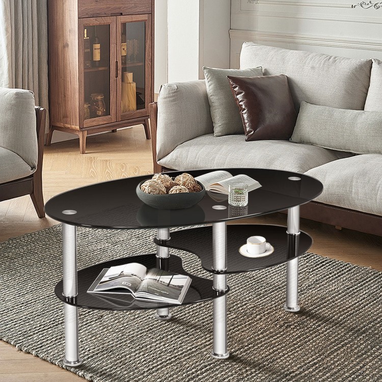 Elegant oval coffee table with black tempered glass and two bottom shelves, perfect for living room storage and style.