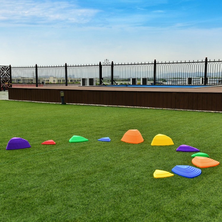 Colorful 11-piece kids balance stepping stones set on grass, designed for outdoor play and developing coordination.