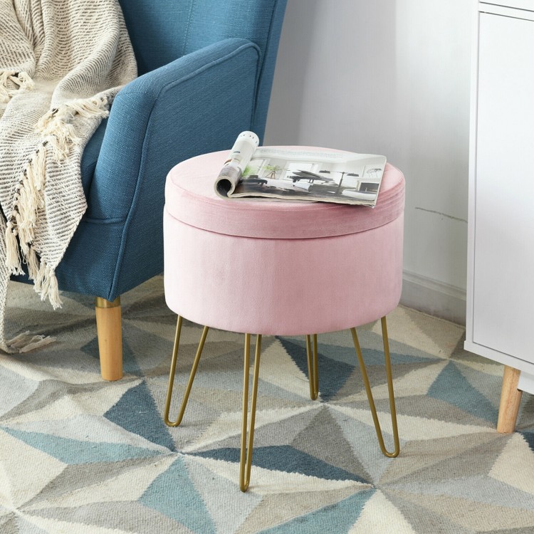 Round pink velvet storage ottoman with gold metal legs, perfect for footrest or stylish storage in any room.