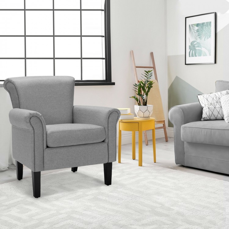 Single light gray upholstered accent chair with curved armrests and overstuffed cushion, ideal for office or study.