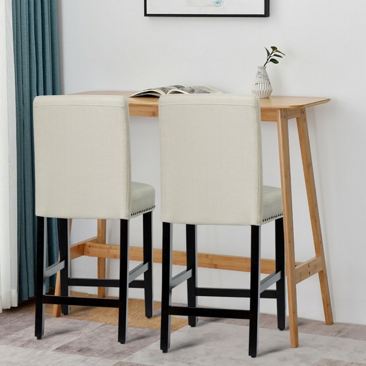Two beige kitchen chairs with rubber wood legs and a curved backrest, ideal for dining or bar use.
