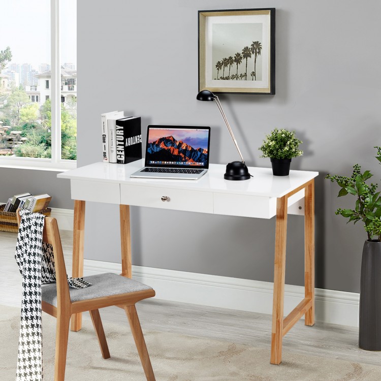 Modern computer desk with rubberwood legs, spacious white surface, and large drawer, perfect for home offices or study.