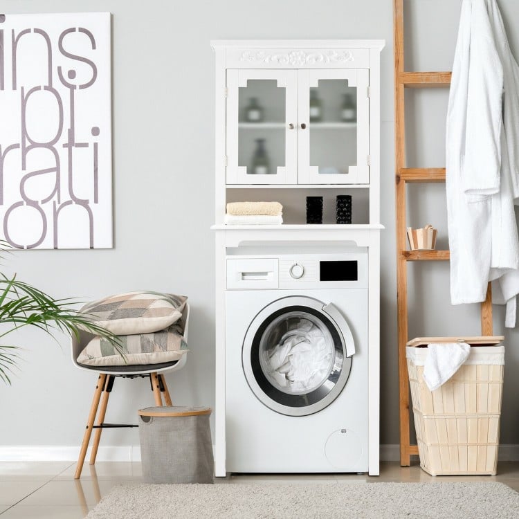 Bathroom Space Saver with carved top, adjustable shelf, and enclosed cabinet, perfect for compact storage solutions.