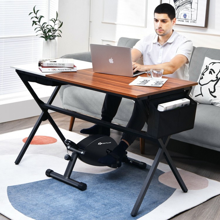 Portable under desk bike pedal exerciser with adjustable magnetic resistance, shown in use for effective leg workouts.