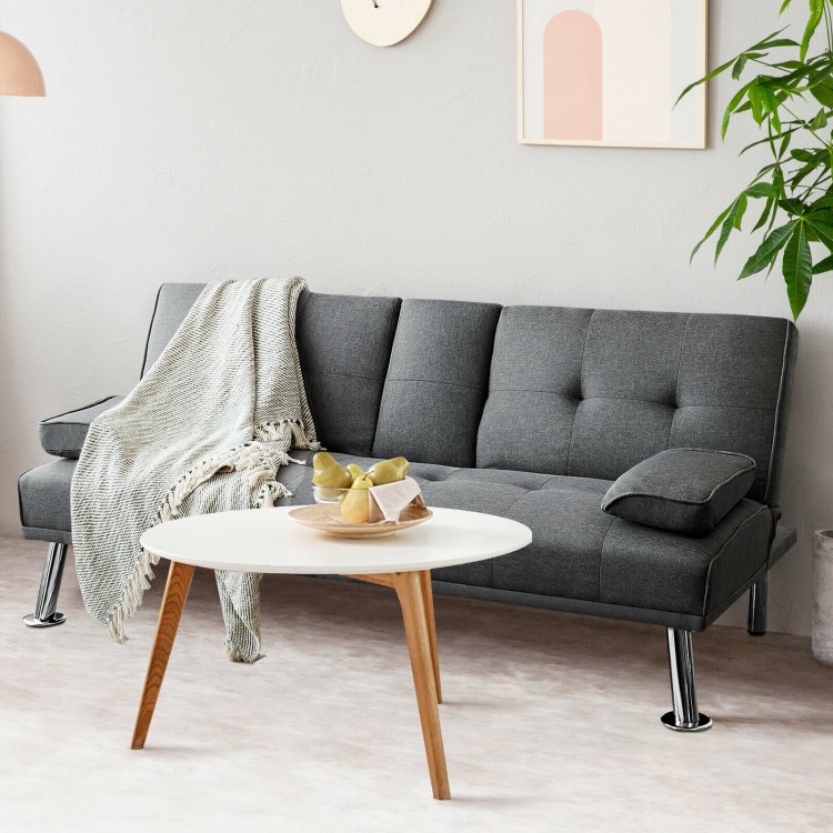Convertible folding futon sofa bed in dark gray fabric with movable armrest and two cup holders, perfect for compact.