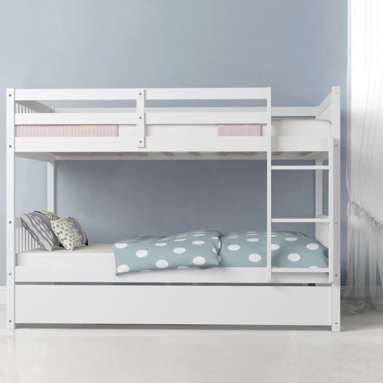 Full over full bunk bed in white wood with trundle, featuring sturdy slats and guardrails, perfect for kids' rooms.
