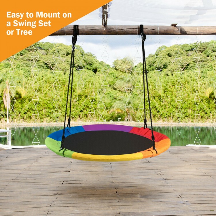 40-inch flying saucer tree swing in rainbow colors, perfect for outdoor play and easy to mount on a swing set or tree.