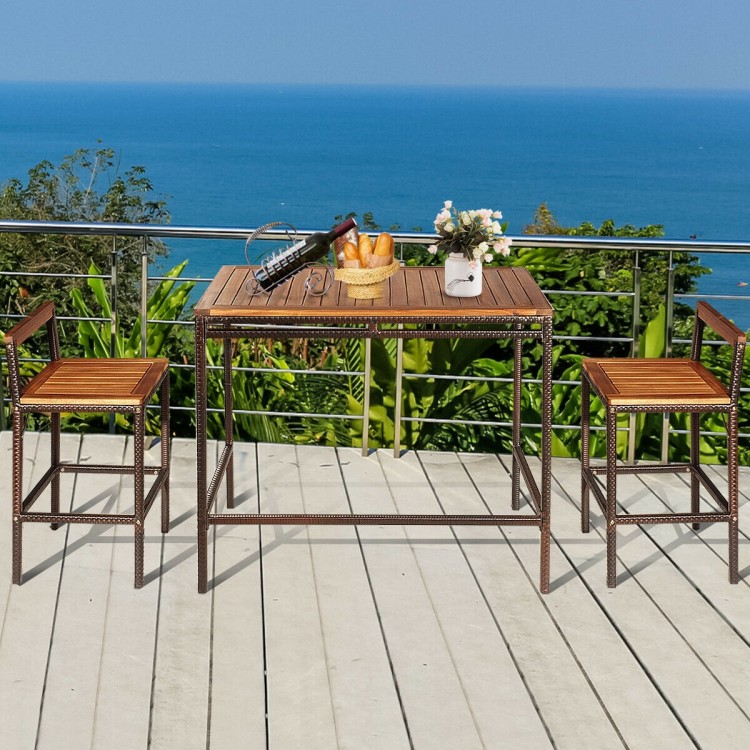 3-piece patio rattan wicker bar dining set with acacia wood top, featuring a table and 2 chairs for outdoor use.