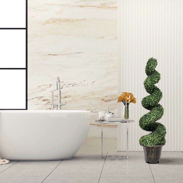 Artificial boxwood spiral tree with green leaves in a stylish indoor setting, perfect for decoration and easy care.