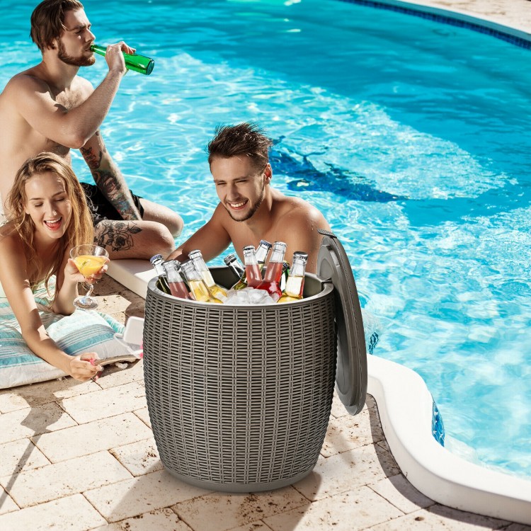 Rattan-style 9.5-gallon patio cool bar with drinks, serving as an ice bucket and side table by the pool.