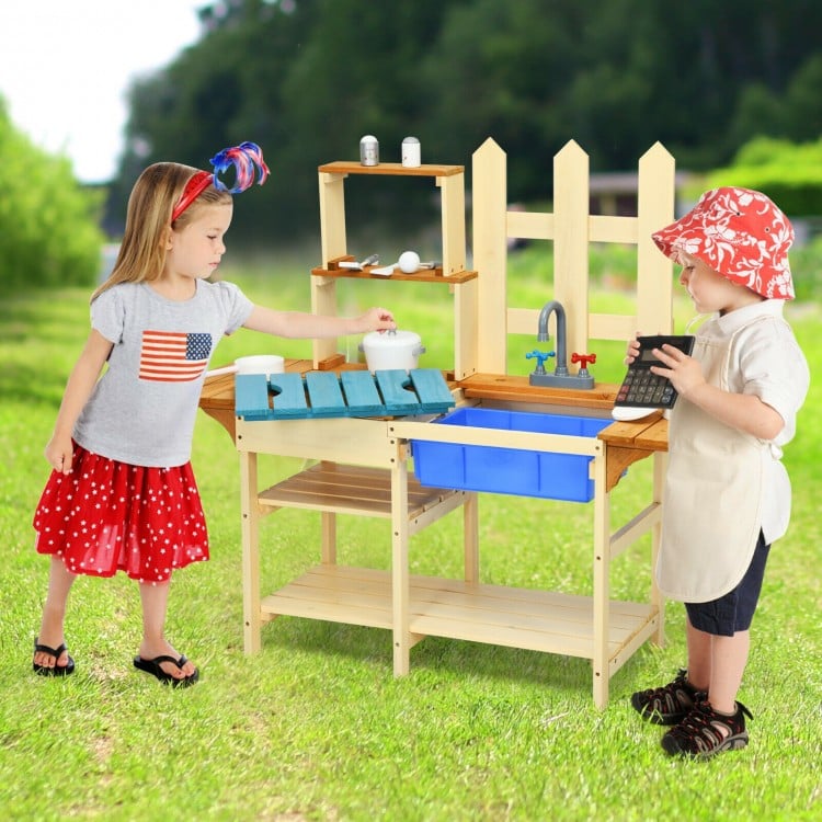 Outdoor wooden pretend cook kitchen playset for kids, made of natural fir wood with open shelves and plastic basin.