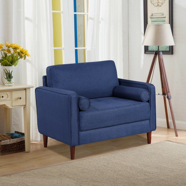 Oversized linen club armchair in navy with rubber wood legs and side pillows, perfect for modern home decor.