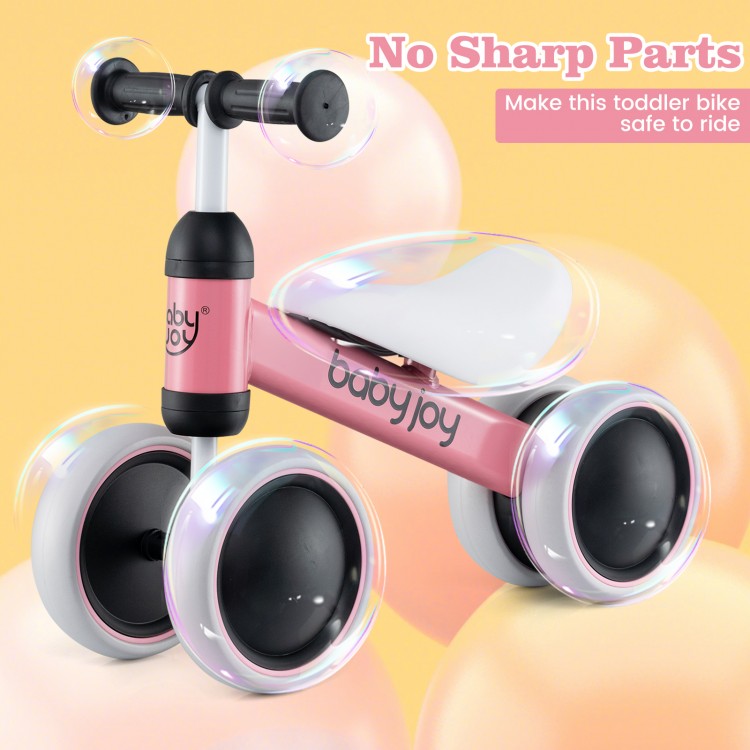 Detail view of the pink Baby Balance Bike showcasing the sturdy rustproof metal frame and quiet, wear-resistant wheels.