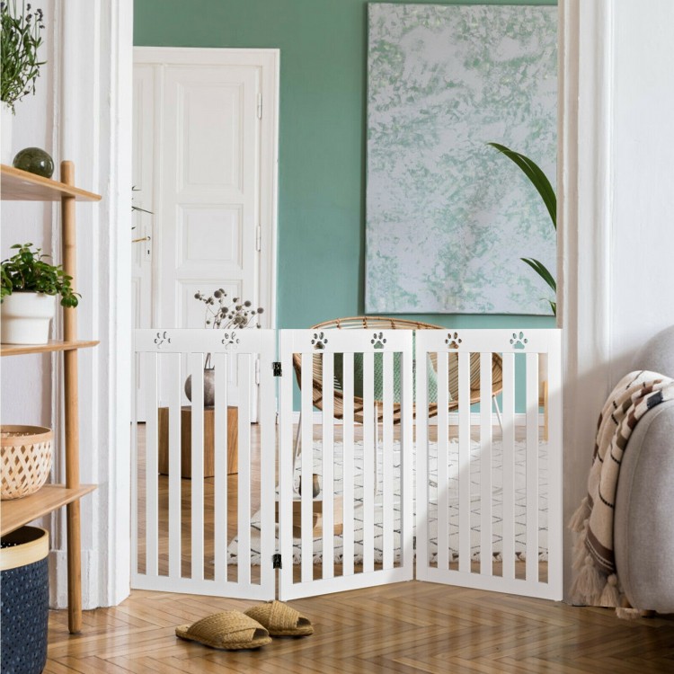 Freestanding 36-inch white wooden pet gate with flexible hinges, ideal for small to medium dogs, perfect for doorways.