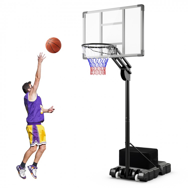 Basketball player shooting at the adjustable hoop with shatterproof backboard, designed for indoor and outdoor use.
