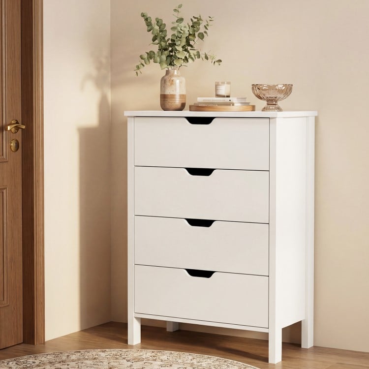 White 4-drawer dresser with minimalist design, anti-tipping kits, and cut-out handles for easy organization in any room.