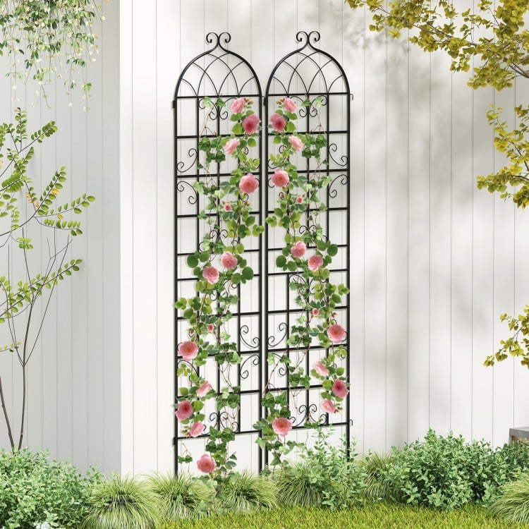 Metal garden trellis with elegant vine design, 86" x 20", perfect for supporting climbing plants in outdoor settings.