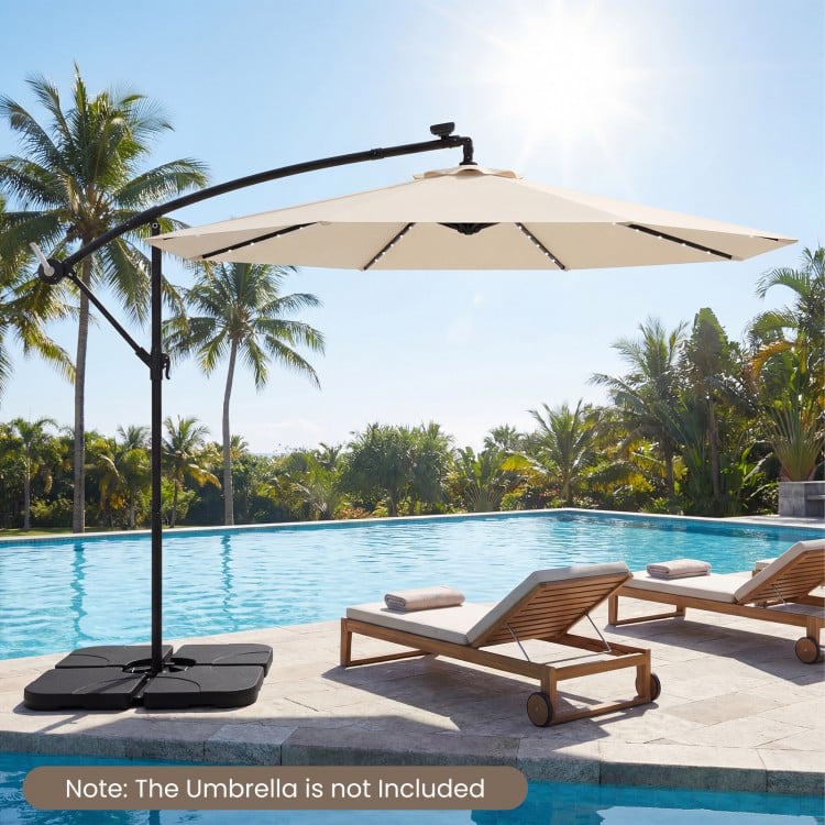 Heavy-duty black cantilever umbrella base with four plates, designed for 9-10 ft umbrellas, ensuring stability by.