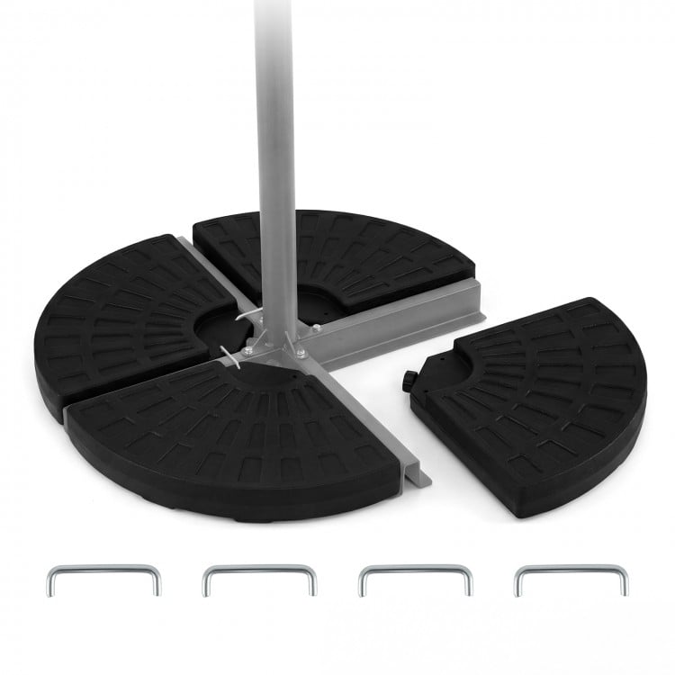 4-piece black patio umbrella base with interlocking plates and U-locking pins for stability in windy conditions.