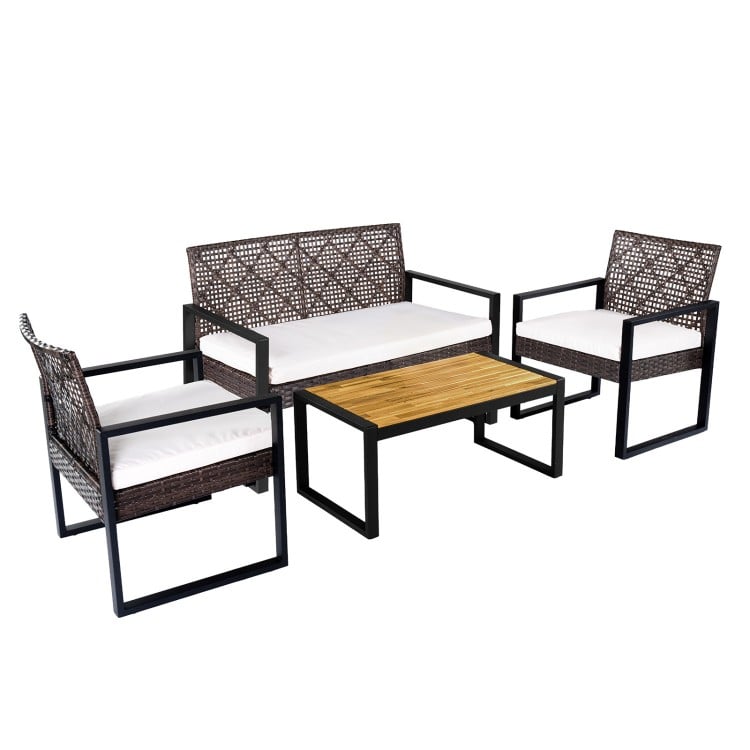 4-piece patio set featuring brown wicker chairs and an acacia coffee table, ideal for backyard relaxation.