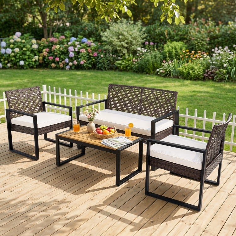 4-piece patio set featuring wicker chairs and an acacia coffee table, ideal for backyard relaxation and outdoor.