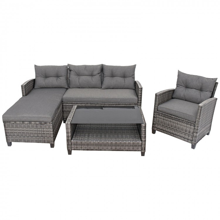 4-piece gray patio rattan furniture set with cushions, including a coffee table, ideal for outdoor relaxation.