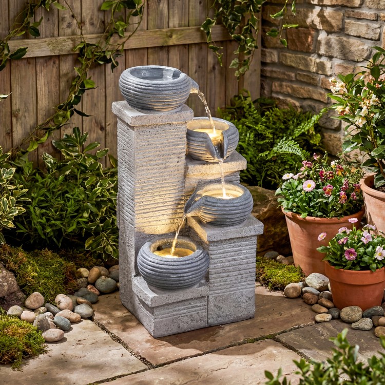 Cascading bowl water fountain with LED lights, showcasing a textured design and lightweight structure for easy.