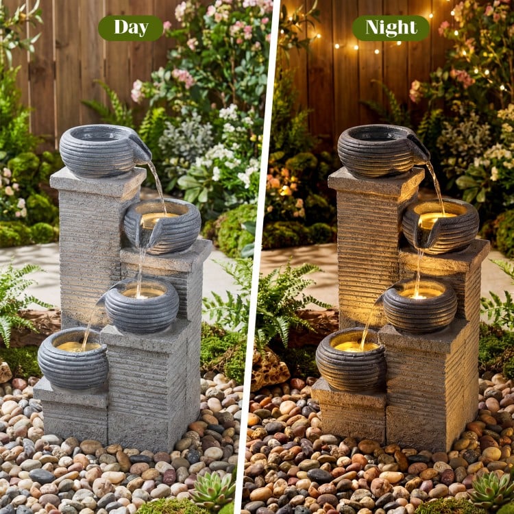 4-tier outdoor water fountain with cascading bowls and LED lights, showcasing a peaceful atmosphere for relaxation.