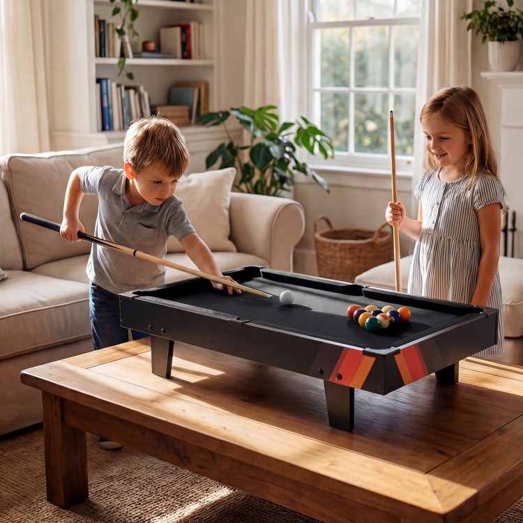 Children playing on the 4 in 1 Combo Game Table Set with Billiards in a cozy living room, perfect for family fun.