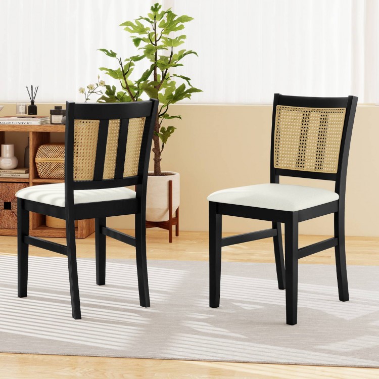 Farmhouse rattan dining chairs set of 2 with rubber wood legs and cane back, featuring beige padded seats for comfort.