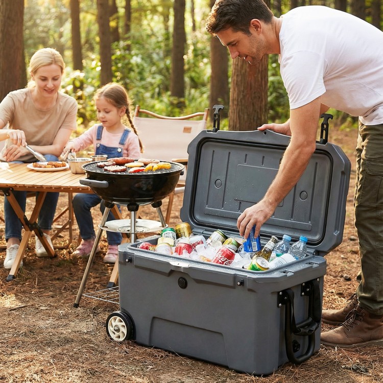 Portable 52 quart hard cooler in gray with wheels, ideal for camping and picnics, featuring 6-day ice retention.