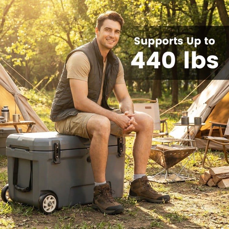 Portable gray cooler with wheels, 52 quart capacity, supports up to 440 lbs, ideal for camping and outdoor activities.