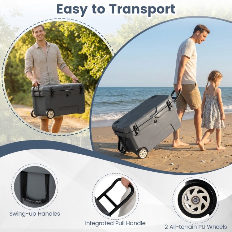 Portable 52 quart hard cooler in gray with wheels, pull handle, and lifting handles for easy transport to the beach.