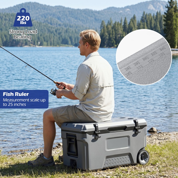 Portable 53 quart gray rolling cooler with fish ruler, sturdy design, and wheels for easy transport during outdoor activities.