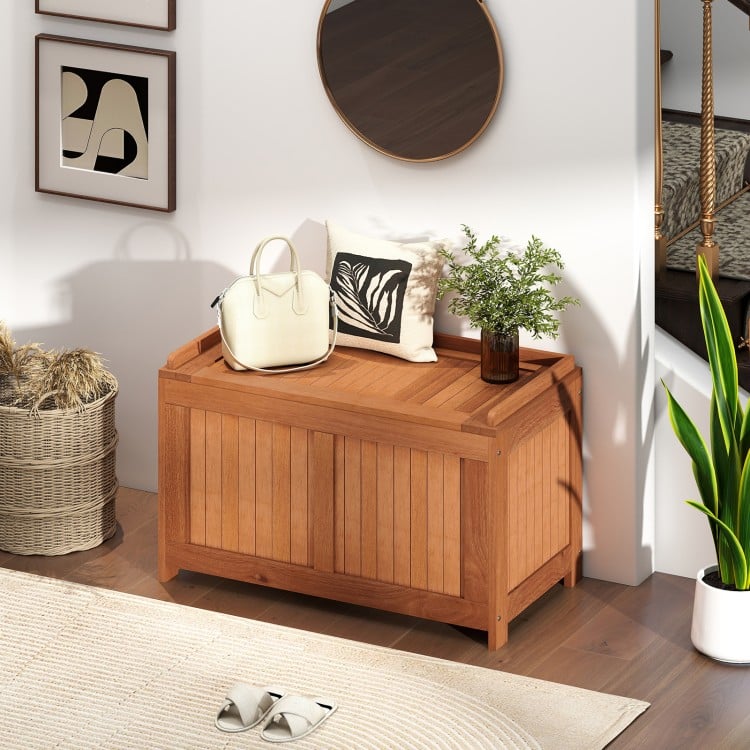 52-gallon patio wood deck box with flip top, ideal for outdoor storage, seating, or as a coffee table in any setting.