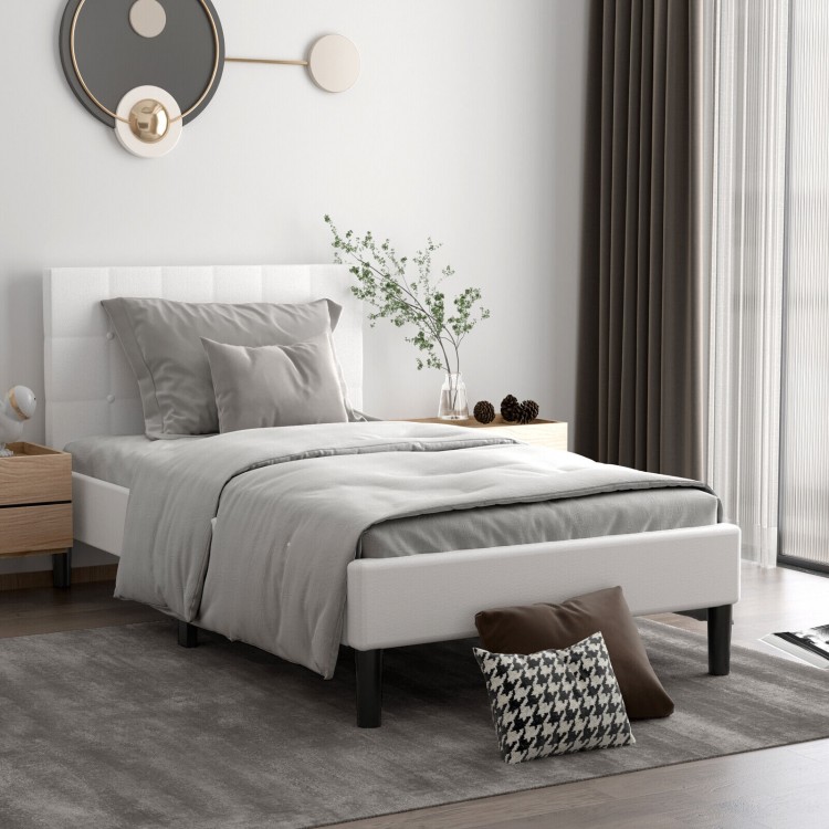 Beige platform bed featuring a tufted headboard, padded side rails, and a sleek design for modern bedroom aesthetics.