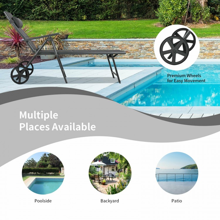 Gray patio reclining chaise lounge with adjustable neck pillow and premium wheels for easy movement by the poolside.