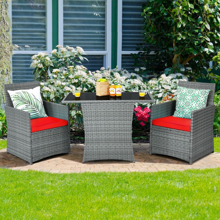 3-piece patio rattan furniture set with cushioned armrests and red cushions, perfect for outdoor relaxation in gardens.